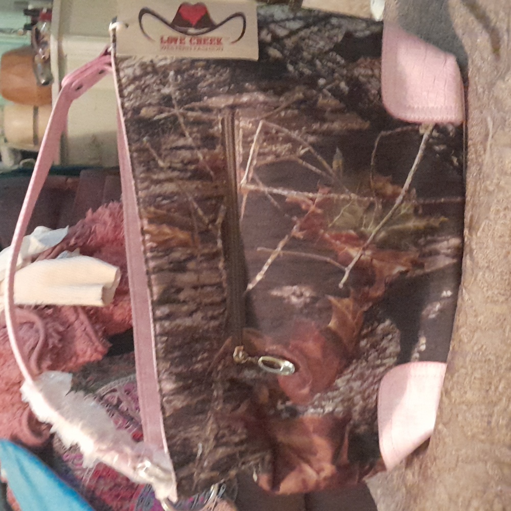 Love Creek Western Wear purse. Camouflage with pink leather. Absolutely adorable